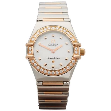 ladies omega constellation diamond bezel.